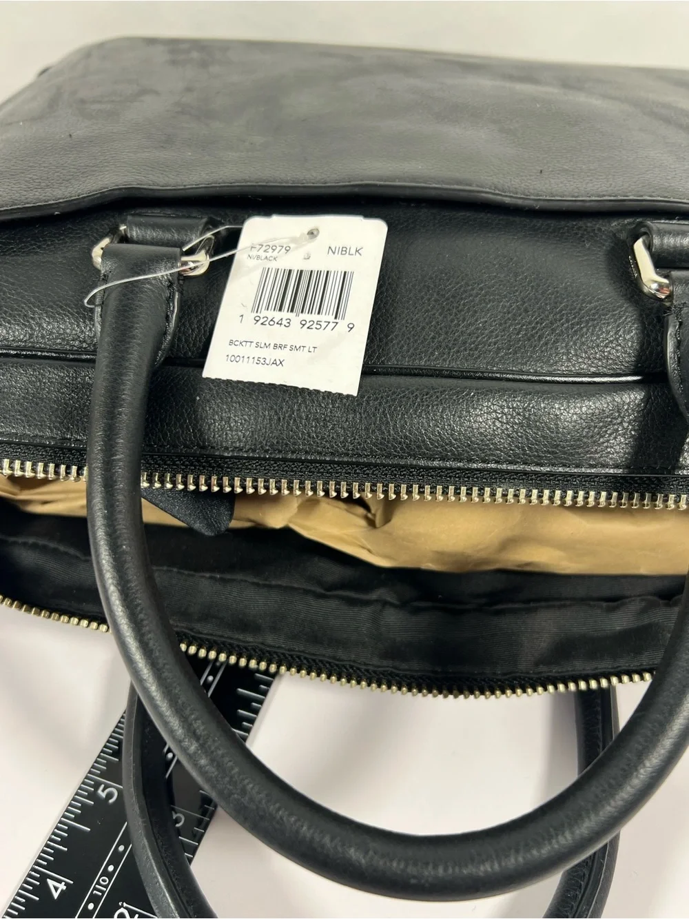 4099: NWT Coach Beckett Slim Brief Black Leather Laptop Bag Scratched Side